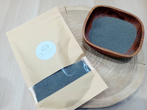 Pouch of grey coloured sand for sand writing tray