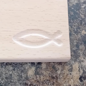 engraved Christian fish (Ichthys) symbol