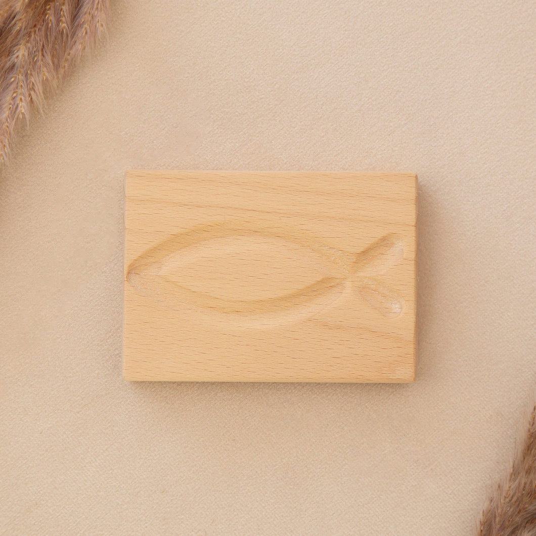 wooden prayer fish