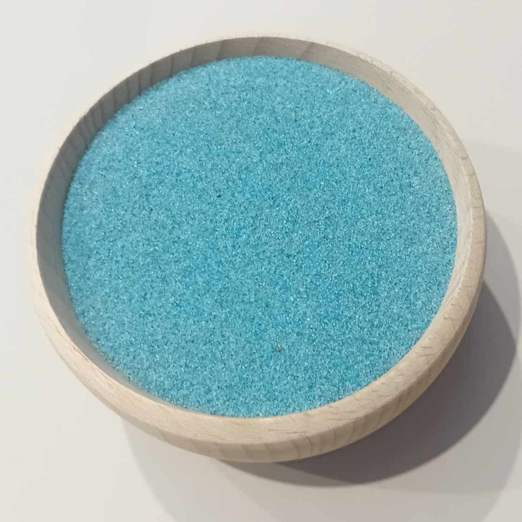coloured blue play sand for sensory play