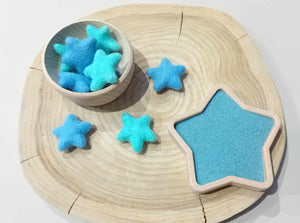 blue felt stars, blue play sand and star sensory play tray