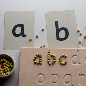 wooden alphabet board and alphabet flashcards