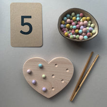 Load image into Gallery viewer, Heart fine motor board with number flashcards, mini felt balls and bamboo tweezers for fine motor skills